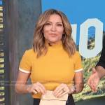 Kit’s yellow top and belted skirt on Access Hollywood