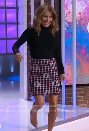 Kit’s black turtleneck and skirt on The Kelly Clarkson Show
