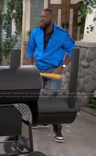 Malcolm’s blue Adidas jacket on The Neighborhood