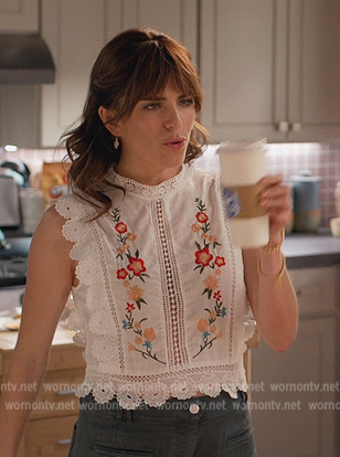 Marina’s white floral embroidered sleeveless top on Home Economics