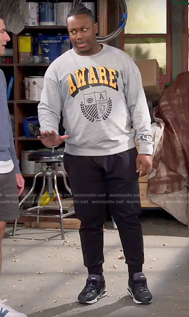 Marty’s AWARE sweatshirt on The Neighborhood