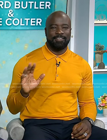 Mike Colter’s orange long sleeve polo shirt on Today