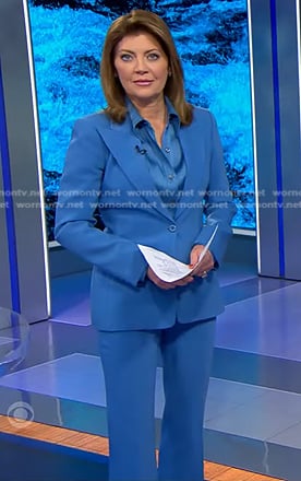 Norah’s blue satin shirt and peak lapel blazer on CBS Evening News