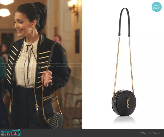 Saint Laurent Vinyle Round Quilted Leather Camera Bag worn by Luna La (Zión Moreno) on Gossip Girl