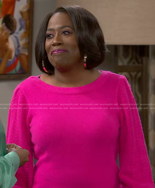 Sheryl Underwood’s pink pointelle knit sleeve sweater on The Talk