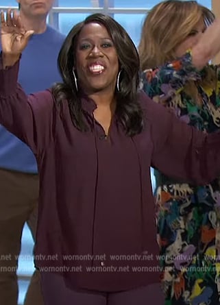 Sheryl’s purple tie neck blouse on The Talk