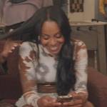 Simone’s white tie dye print top on All American Homecoming