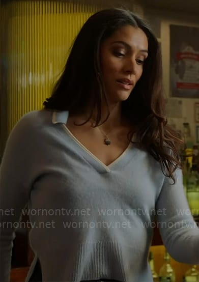Stella’s light blue sweater with white trim on Chicago Fire