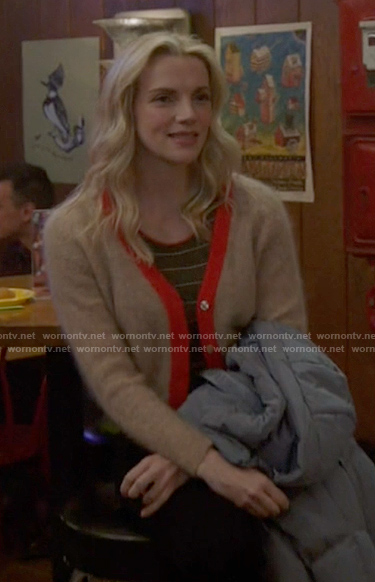 Sylvie’s beige cardigan with red trim on Chicago Fire