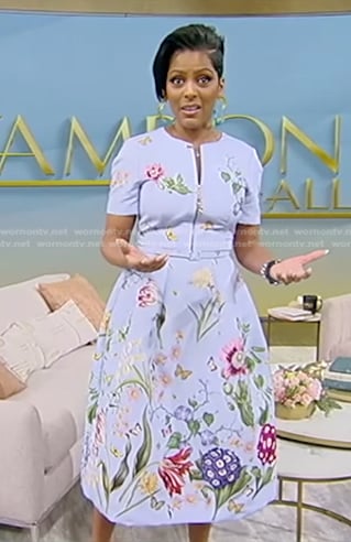 Tamron’s light blue floral zip dress on on Tamron Hall Show