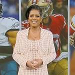 Tamron’s pink tweed check mini dress on Tamron Hall Show
