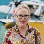 Tara’s floral top and yellow pants on Fantasy Island