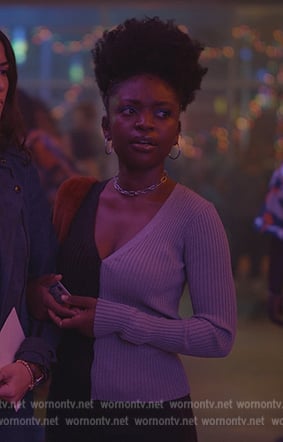 Tasha’s blue two-tone cardigan on National Treasure: Edge of History