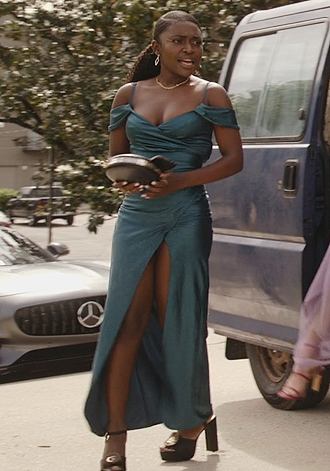 Tasha’s green metallic cold shoulder dress on National Treasure: Edge of History