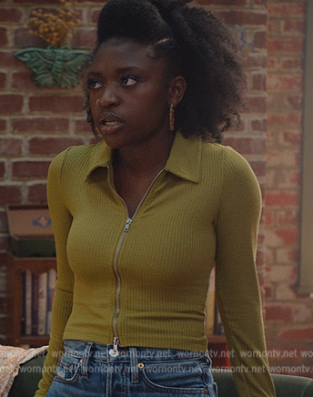 Tasha’s green zip down cardigan on National Treasure: Edge of History