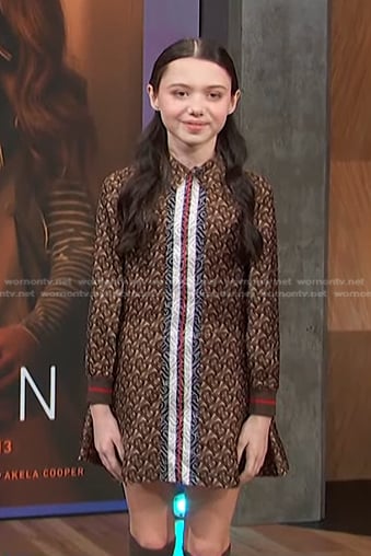 Violet McGraw’s brown monogram print dress on Access Hollywood