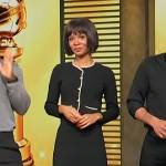 Zuri’s pearl trim cardigan and mini skirt on Access Hollywood