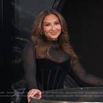 Adrienne’s black mesh sleeve corset dress on E! News