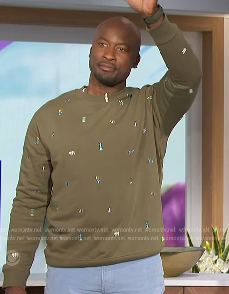 Akbar’s green embroidered sweatshirt on The Talk