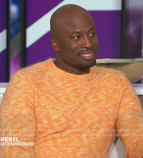 Akbar’s orange marled sweater on The Talk