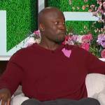 Akbar’s red heart print sweater on The Talk