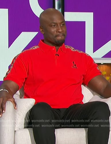 Akbar’s red polo shirt on The Talk
