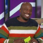 Akbar’s stripe fuzzy sweater on The Talk