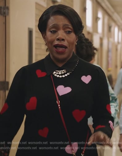 Barbara’s black heart print sweater on Abbott Elementary