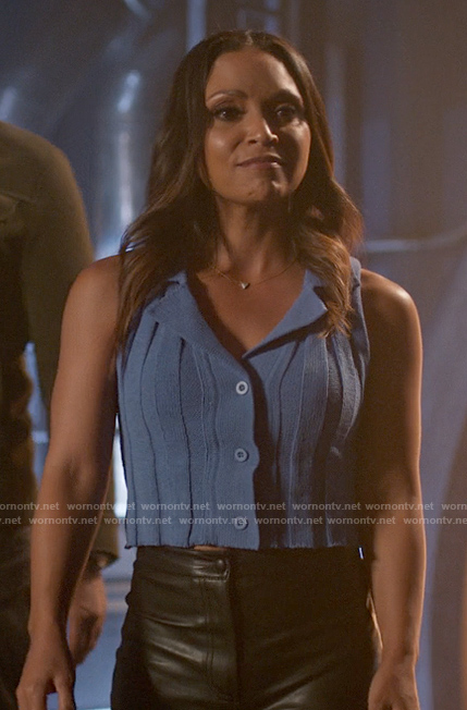 Cecile’s blue sleeveless knit button up top on The Flash