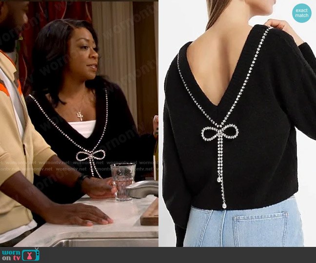Express Bow Embellished Convertible Sweater worn by Tina Butler (Tichina Arnold) on The Neighborhood