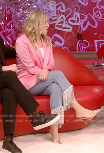 Jenny Mollen’s pink satin blazer and metallic fringe jeans on Live with Kelly
