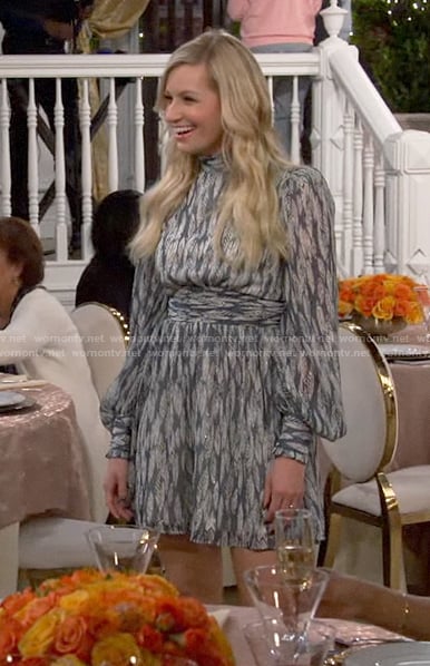 Gemma’s feather print dress on The Neighborhood