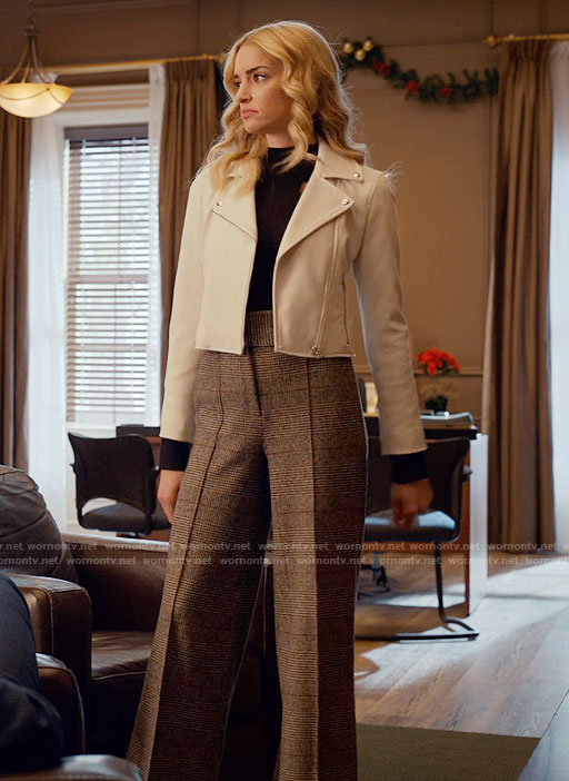 Georgia’s white leather jacket, plaid wide leg pants and star moon earrings on Ginny & Georgia