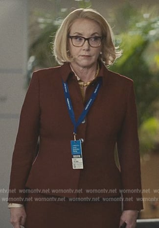 Gerri’s burgundy jacket and skirt on Succession