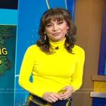 Ginger’s yellow turtleneck top and plaid mini skirt on Good Morning America
