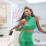 Guerdy’s green cropped top and pants on The Real Housewives of Miami