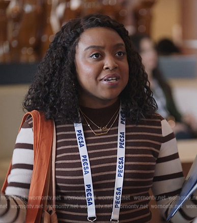 Janine’s brown contrast stripe sweater on Abbott Elementary