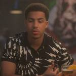 Junior’s black bolt print polo on Grown-ish
