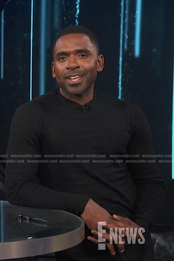 Justin’s black textured sweater on E! News