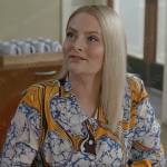 Lexi’s blue and orange printed blouse on Not Dead Yet
