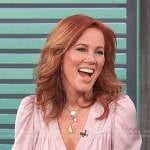 Elisa Donovan’s pink v-neck satin top on Access Hollywood