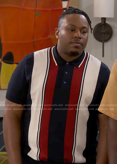 Marty’s navy and red striped polo shirt on The Neighborhood