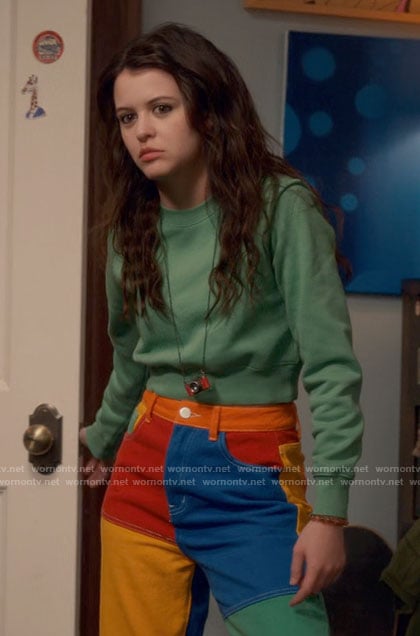 Maxine’s green sweatshirt and rainbow jeans on Ginny & Georgia