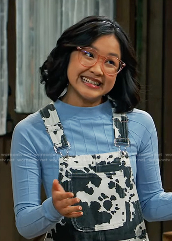 Megan’s cow print short overalls on Bunkd