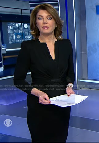 Norah’s black gathered sheath dress on CBS Evening News