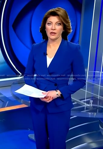 Norah’s blue collarless blazer and pants on CBS Evening News