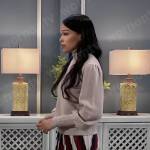 Portia’s beige turtleneck and striped skirt on General Hospital