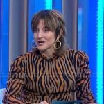 Rachel Simmons’s orange zebra print top on Good Morning America