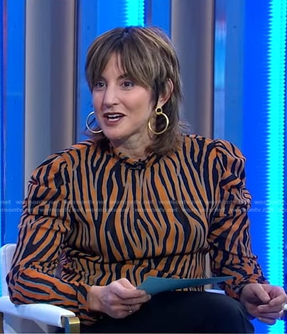 Rachel Simmons’s orange zebra print top on Good Morning America