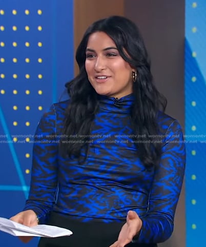 Reena Roy’s blue printed turtleneck top on Good Morning America